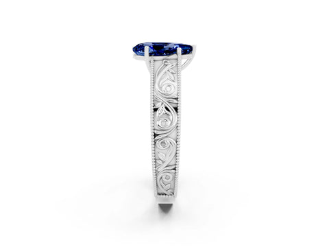 White gold Pear Cut Blue Sapphire Solitaire Ring with Engraved Band and Four-Prong Setting_2