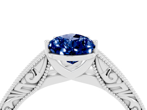 White gold Pear Cut Blue Sapphire Solitaire Ring with Engraved Band and Four-Prong Setting_4