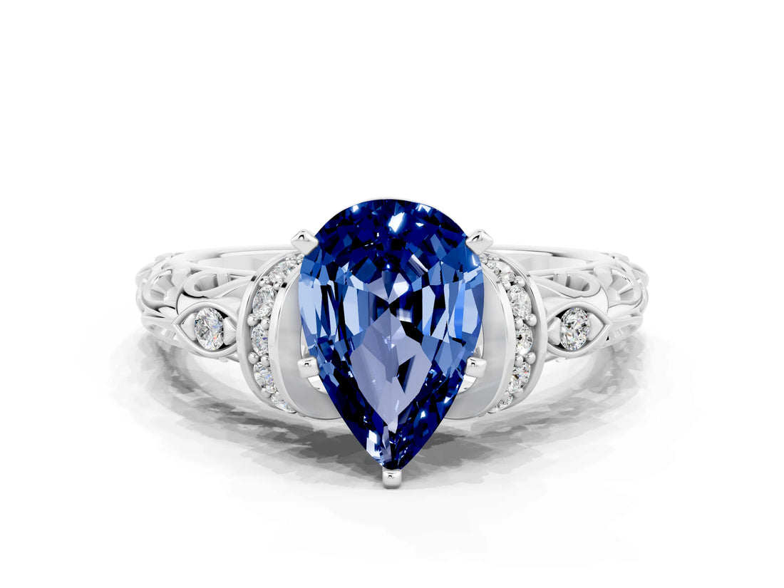 White gold Pear Cut Blue Sapphire Solitaire Ring with Filigree Band and Four-Prong Setting_24