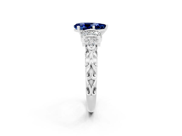 Silver Pear Cut Blue Sapphire Solitaire Ring with Filigree Band and Four-Prong Setting