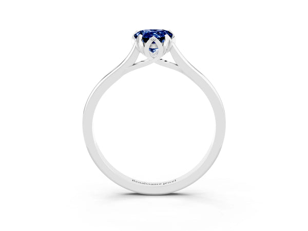 Platinum Pear Cut Blue Sapphire Solitaire Ring with Flower Prong Setting and Classic Band