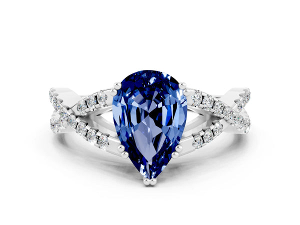 Silver Pear Cut Blue Sapphire Solitaire Ring with Four-Prong Setting and Twisted Pavé Band