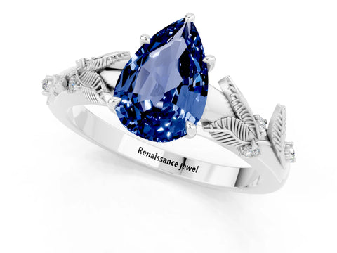 White gold Pear Cut Blue Sapphire Solitaire Ring with Leaf Motif Band and Four-Prong Setting_1