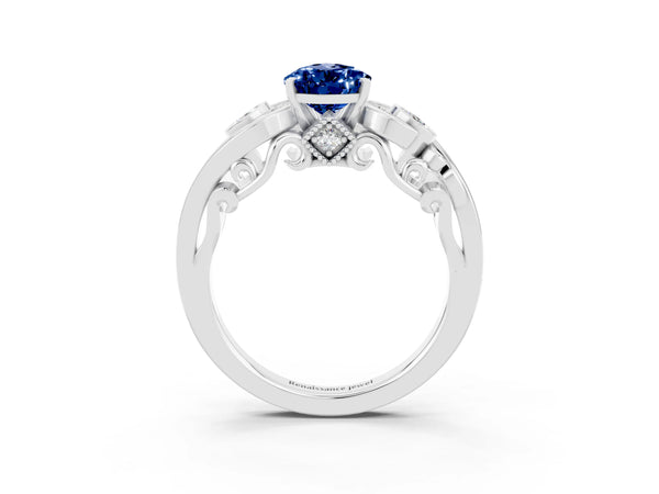 Platinum Pear Cut Blue Sapphire Solitaire Ring with Milgrain Pavé Band and Four-Prong Setting