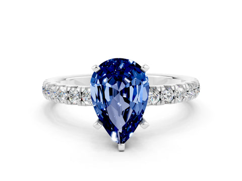 White gold Pear Cut Blue Sapphire Solitaire Ring with Pavé Accents and Four-Prong Setting