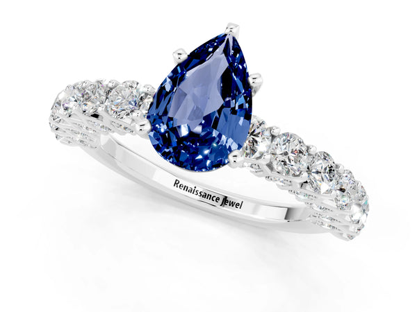 White gold Pear Cut Blue Sapphire Solitaire Ring with Shared Prong Pavé Band and Four-Prong Setting