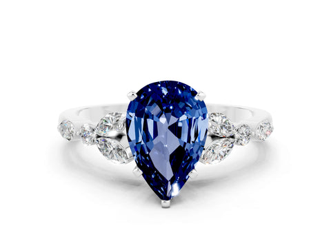 White gold Pear Cut Blue Sapphire Solitaire Ring with Side Stones and Four-Prong Setting_48