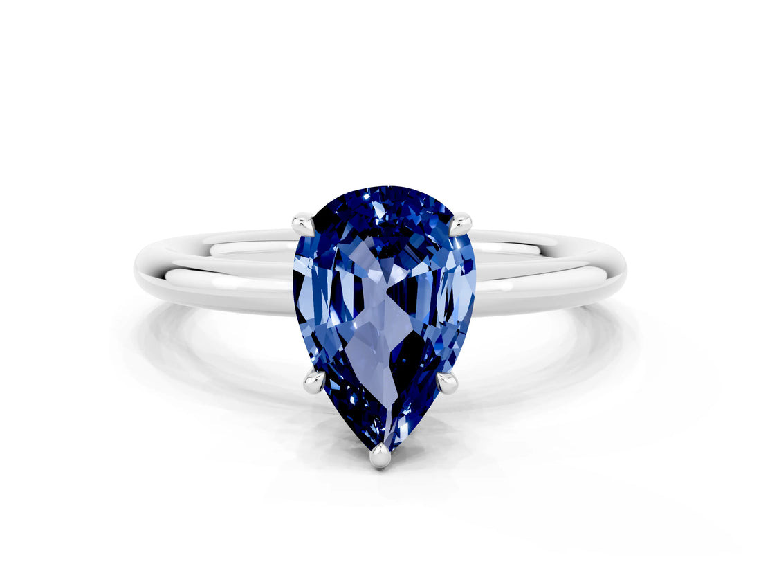 White gold Pear Cut Blue Sapphire Solitaire Ring with Thin Band and Four-Prong Setting_12