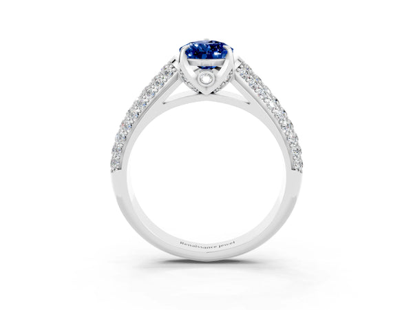 Platinum Pear Cut Blue Sapphire Solitaire Ring with Three-Row Pavé Band and Four-Prong Setting