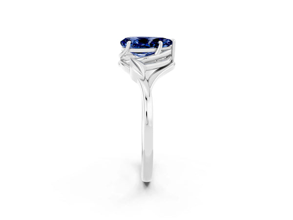 Silver Pear Cut Blue Sapphire Solitaire Ring with Twist Band and Four-Prong Setting