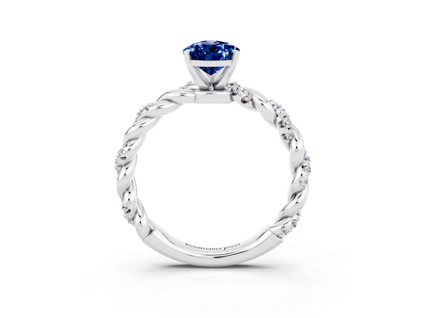 Platinum Pear Cut Blue Sapphire Solitaire Ring with Twisted Band and Pavé Accents