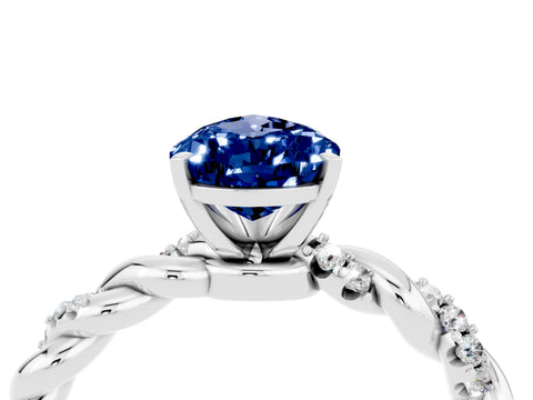 White gold Pear Cut Blue Sapphire Solitaire Ring with Twisted Band and Pavé Accents_4