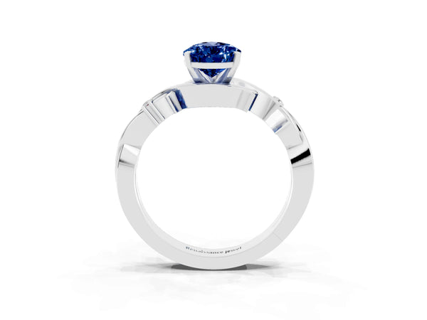 Platinum Pear Cut Blue Sapphire Solitaire Ring with Twisted Band and Prong Setting