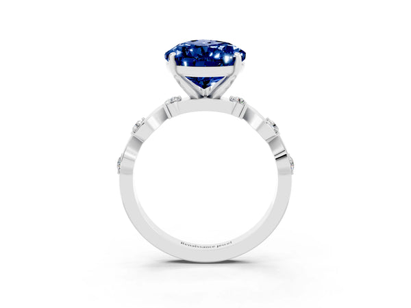 Platinum Pear Cut Blue Sapphire Solitaire Twisted Band with Round  Accents and Prong Setting