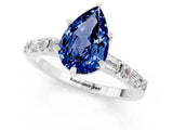 White gold Pear Cut Blue Sapphire Solitaire with Side Baguettes and Channel Set Band_1