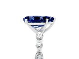 White gold Pear Cut Blue Sapphire Solitaire with Side Stones on a Pavé Band and Four-Prong Setting_5