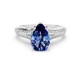 White gold Pear Cut Blue Sapphire Split Shank Engagement Ring with Pavé Band