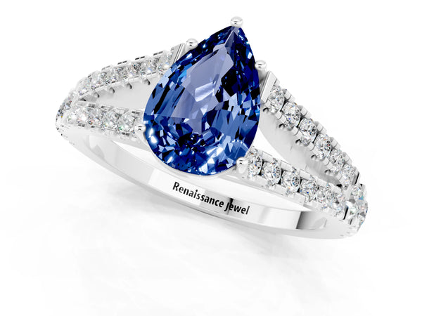 White gold Pear Cut Blue Sapphire Split Shank Pavé Engagement Ring with Four-Prong Setting