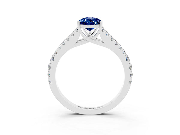 Platinum Pear Cut Blue Sapphire Split Shank Pavé Engagement Ring with Four-Prong Setting