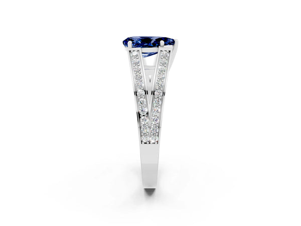 Platinum Pear Cut Blue Sapphire Split Shank Ring with Pavé Band and Four-Prong Setting