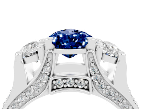 White gold Pear Cut Blue Sapphire Three-Stone Ring with Channel Set Band and Four-Prong Setting_4