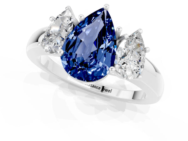 Platinum Pear Cut Blue Sapphire Three-Stone Ring with Four-Prong Setting and Classic Band