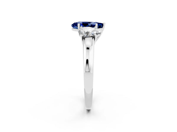 White gold Pear Cut Blue Sapphire Three-Stone Ring with Four-Prong Setting and Classic Band