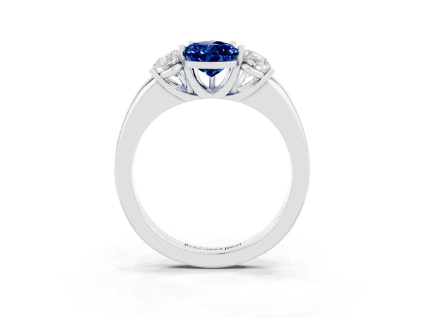Platinum Pear Cut Blue Sapphire Three-Stone Ring with Four-Prong Setting and Classic Band