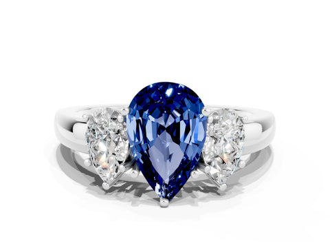 White gold Pear Cut Blue Sapphire Three-Stone Ring with Four-Prong Setting and Classic Band