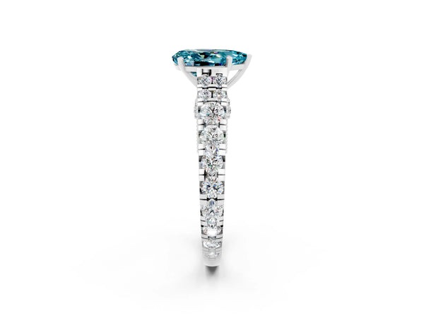 Platinum Pear Cut Blue Topaz Classic Solitaire Ring with Pavé Band and Four-Prong Setting