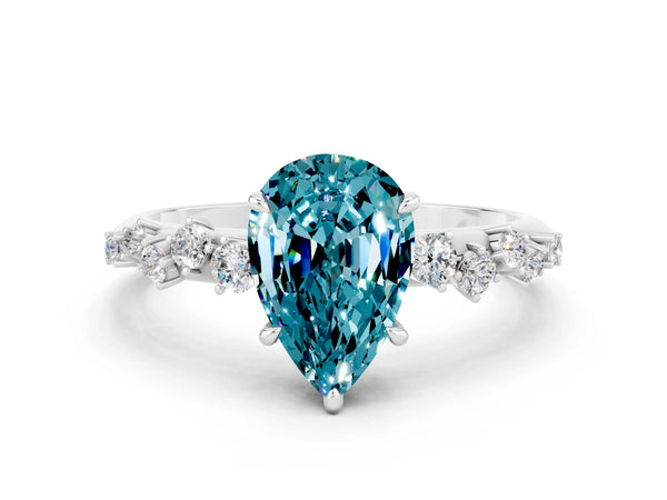 Platinum Pear-Shaped Blue Topaz Graduated Cluster Solitaire Engagement Ring with Open Basket