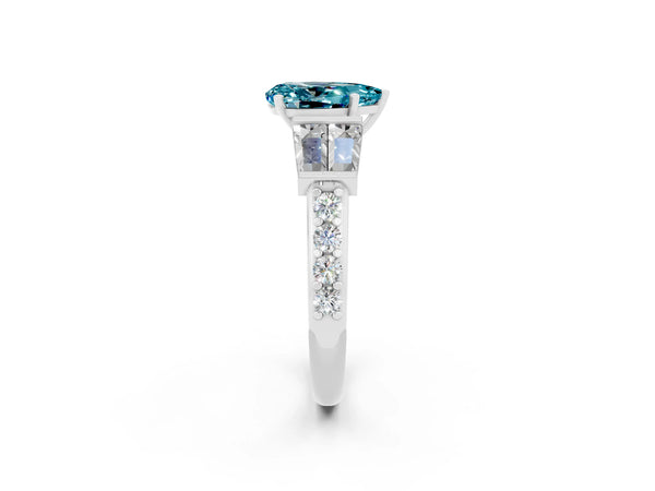 Silver Pear Cut Blue Topaz Engagement Ring with Baguette Side Stones and Channel Set Band