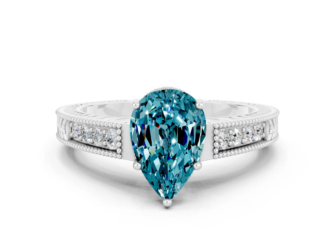 White gold Pear Cut Blue Topaz Engagement Ring with Milgrain Channel Set Band and Prong Setting