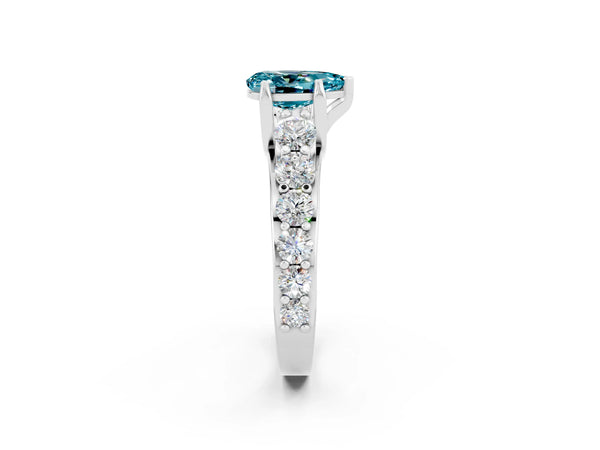 Silver Pear Cut Blue Topaz Engagement Ring with Pavé Band and Four-Prong Setting
