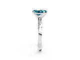 White gold Pear Cut Blue Topaz Engagement Ring with Side Stone Accents and Four-Prong Setting_74