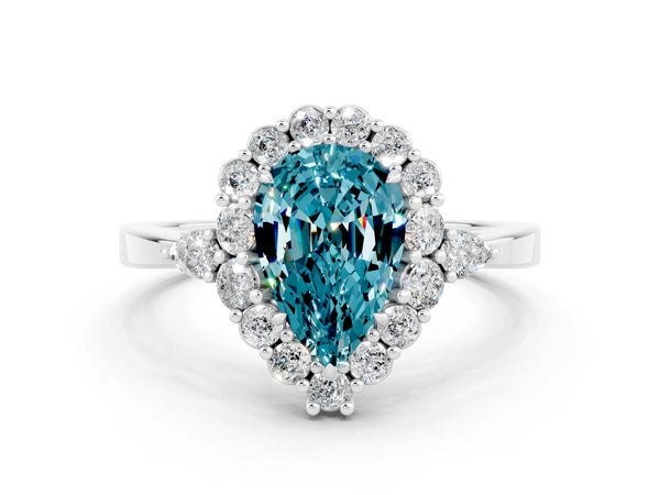 Platinum Pear Cut Blue Topaz Halo Ring with Pear Side Stones and Prong Setting