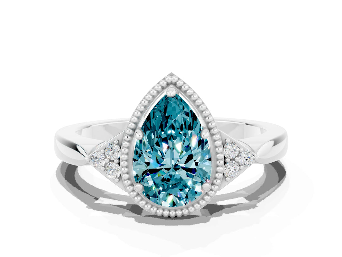 White gold Pear Cut Blue Topaz Halo Ring with Tapered Band and Four-Prong Setting