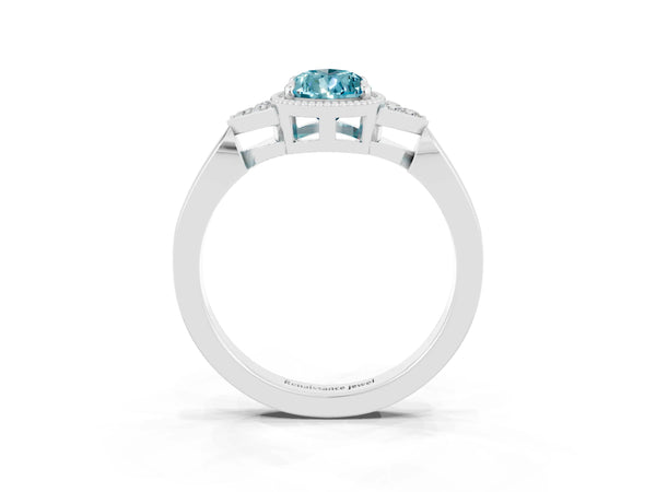 Platinum Pear Cut Blue Topaz Halo Ring with Tapered Band and Four-Prong Setting