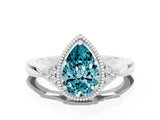 White gold Pear Cut Blue Topaz Halo Ring with Tapered Band and Four-Prong Setting