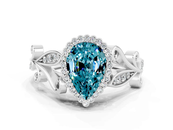 Platinum Pear Cut Blue Topaz Halo Ring with Vintage Split Shank and Four-Prong Setting