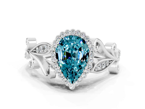 White gold Pear Cut Blue Topaz Halo Ring with Vintage Split Shank and Four-Prong Setting