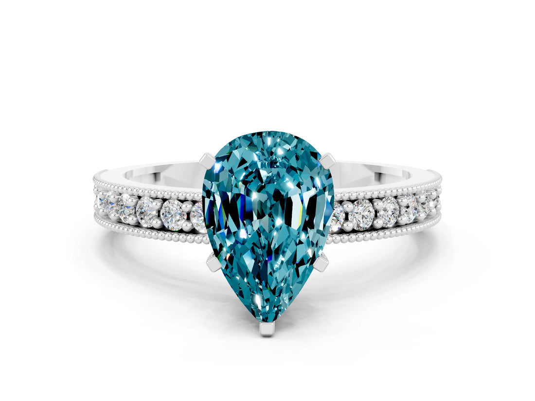White gold Pear Cut Blue Topaz Milgrain Pavé Engagement Ring with Four-Prong Setting