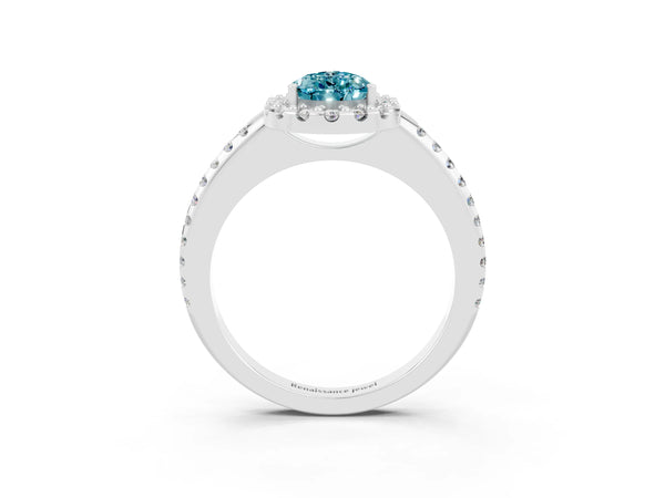Platinum Pear Cut Blue Topaz Pavé Halo Ring with Four-Prong Setting