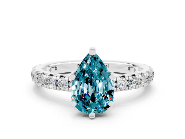 Silver Pear Cut Blue Topaz Pavé Solitaire Ring with Round Band and Prong Setting