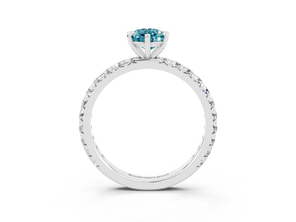 Platinum Pear Cut Blue Topaz Pavé Solitaire Ring with Round Band and Prong Setting