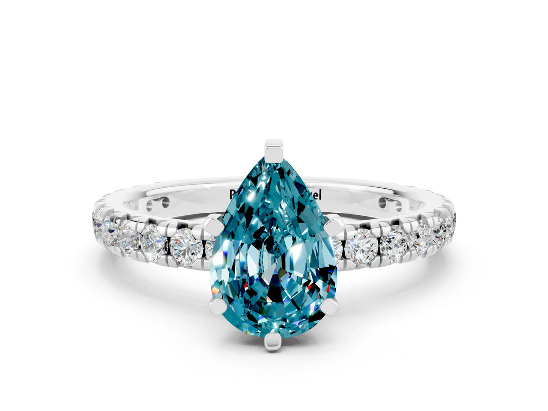 White gold Pear Cut Blue Topaz Pavé Solitaire Ring with Round Band and Prong Setting_36