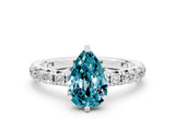 White gold Pear Cut Blue Topaz Pavé Solitaire Ring with Round Band and Prong Setting_36