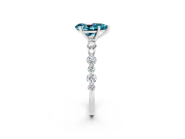 Silver Pear Cut Blue Topaz Prong Set Engagement Ring with Pavé Band