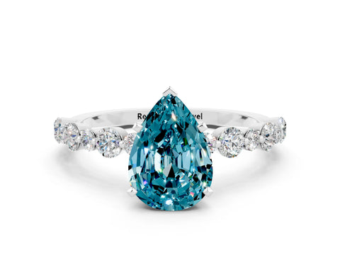 White gold Pear Cut Blue Topaz Prong Set Engagement Ring with Pavé Band