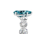 White gold Pear Cut Blue Topaz Prong Setting with Side Stones on a Pave Band_5